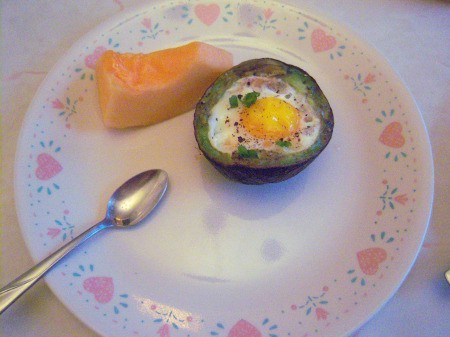 Baked Eggs in Avocado on plate