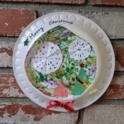 Paper Plate Framed Christmas Decoration - framed artwork hanging on fireplace