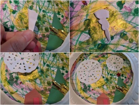 Paper Plate Framed Christmas Decoration - collage of art with themed cutouts and paper snowflakes ready to glue down