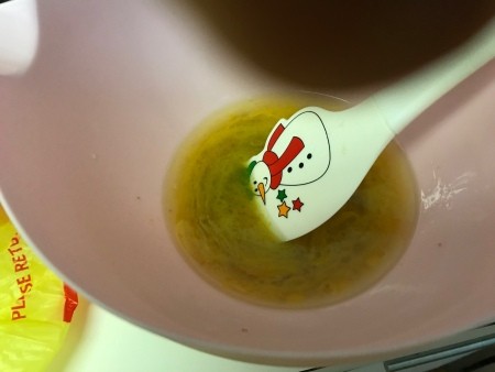 mixing egg in oil & sugar