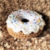 Crocheted Donut Pincushion - icing in place with pins randomly stuck in place