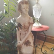 Identifying a Large Old Italian Statue - woman sitting