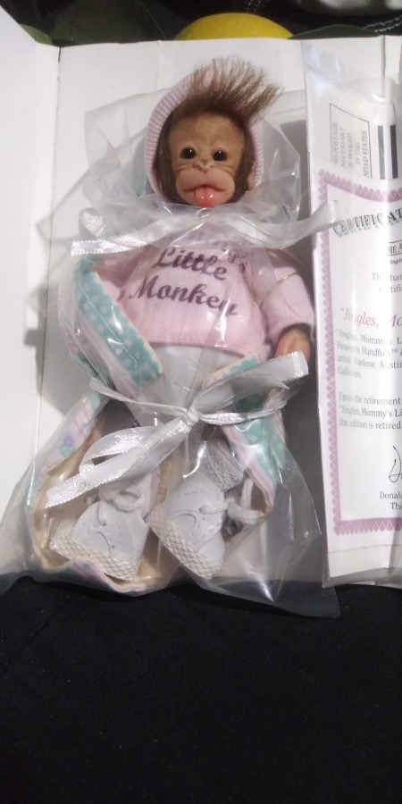 Age of an Ashton-Drake Monkey Doll - baby monkey doll in box