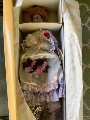 A Romantic Flower Maiden doll in the box.