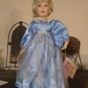 Value of a Paradise Galleries Doll - blond doll in long blue dress