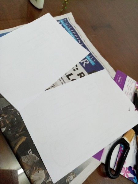 Wiggly Paper Snowman - cut a piece of paper in half