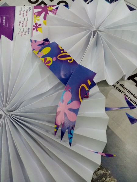 Wiggly Paper Snowman - cut a paper strip from a magazine for the scarf and glue in place