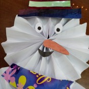 Wiggly Paper Snowman - cut and glue in place the nose, eyes, and mouth