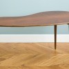 A midcentury modern wooden coffee table.