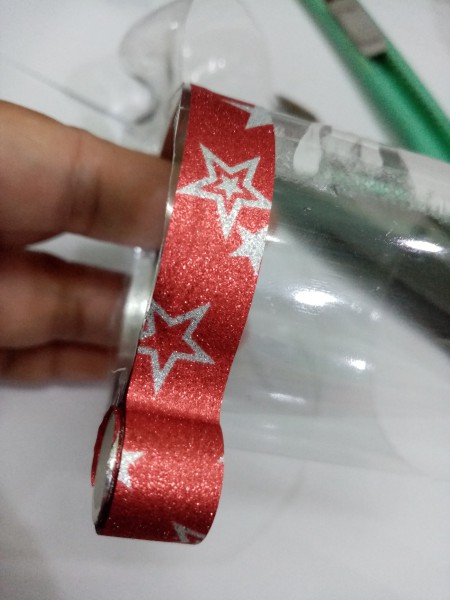 Recycled Plastic Bottle Christmas Balls - wrapping washi tape around the bottle