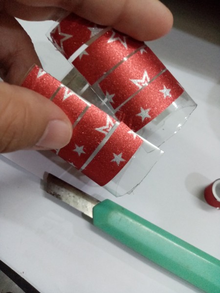 Recycled Plastic Bottle Christmas Balls - cut the bottle in half top to bottom after wrapping tape around in several lines