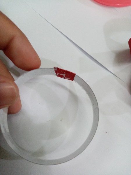 Recycled Plastic Bottle Christmas Balls - use matching tape to secure the ends together