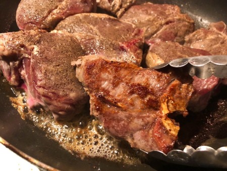 browned chop turned over