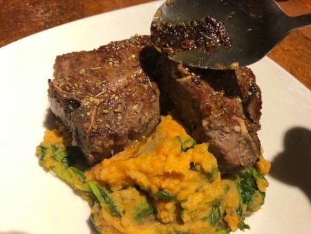 Spooning Garlic Brandy Butter on Lamb Loin Chops