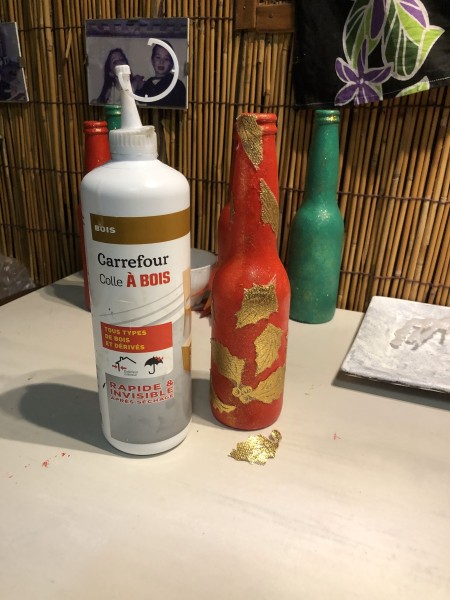 Recycled Bottle Gold Leaf Candlestick Holders - red bottle with gold leaves glued in place