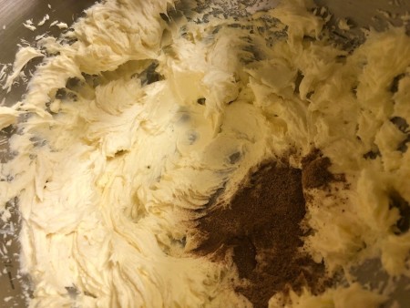 adding spices to frosting