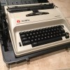 Repairing an Olympia Reporter Electric Typerwriter - typewriter in a case
