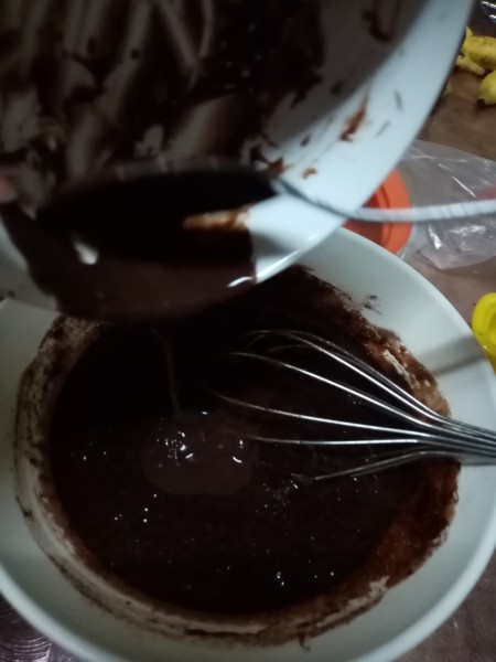 pouring chocolate in batter