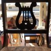 Value of a Murphy Chair - dark wood chair with upholstered seat and lyre back