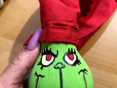 Light Bulb Grinch Ornament - wrap a piece of red fabric around the top of the bulb, overlap a bit and cut off excess