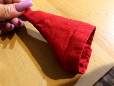 Light Bulb Grinch Ornament - roll fabric into a cone shape and glue from the inside and glue into a cone shape