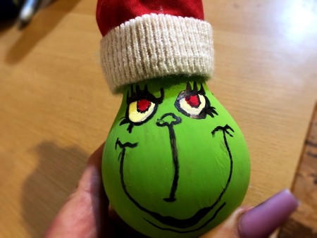 Light Bulb Grinch Ornament - cut a strip of white fabric and wrap around the bottom of the hat and glue