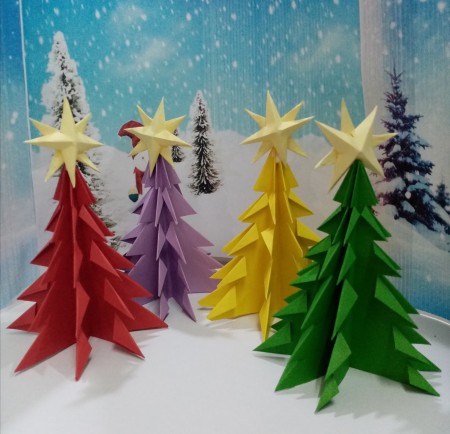 Colorful Paper Mini Table Top Christmas Tree - 4 colorful trees in front of a snowy backdrop