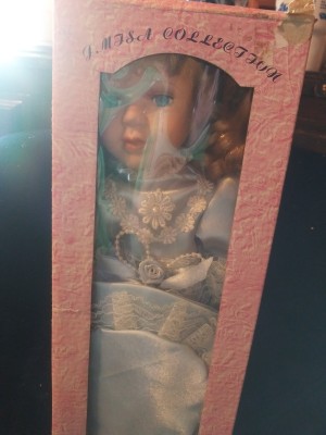 Value of a J. Misa Porcelain Doll - doll in a box