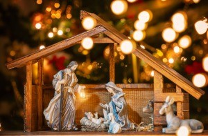 A nativity scene showing Mary, Joseph and Jesus in the manger.