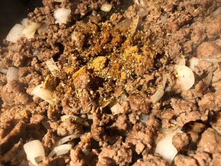 spices added to beef and onions