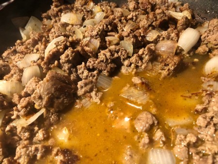 adding water to meat mixture