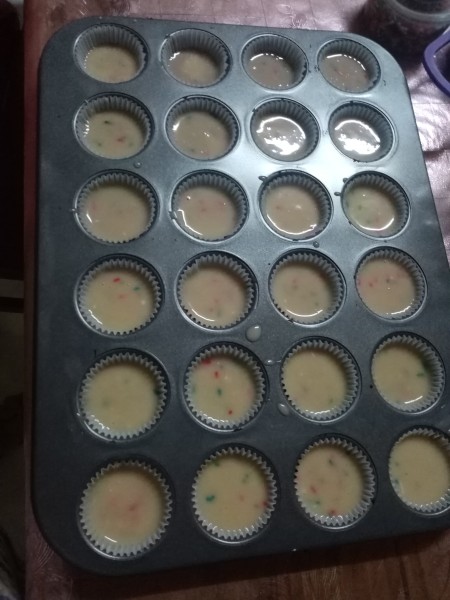 filled pan of 1oz cup cakes to bake