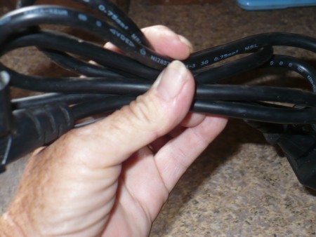 Organizing and Storing Laptop Cables - roll up the cable
