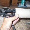 Organizing and Storing Laptop Cables - slide the cable into the paper towel tube