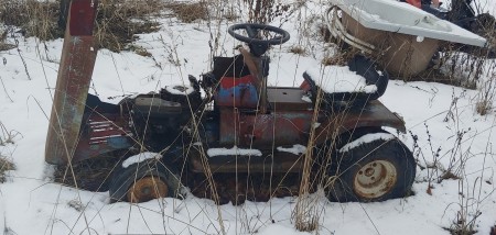 A vintage Eaton Viking Ride-on Lawn Mower.