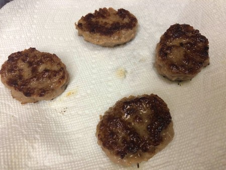 Sausage patties on paper towel