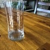 Identifying a Old Drinking Glass - clear glass with a band of swirly leaf garlands around the middle