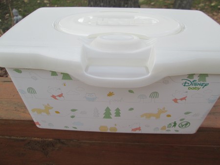 A recycled baby wipe container, ready for decorating.