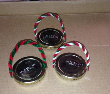 Pasta Jar Snowman Luminaries - lids with pipe cleaners glued in place