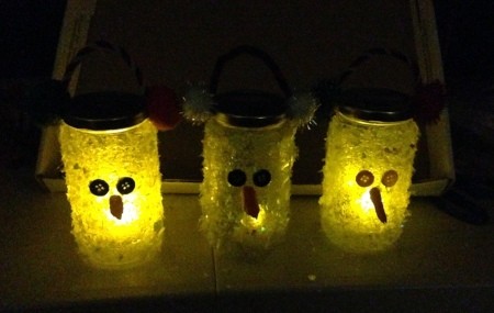 Pasta Jar Snowman Luminaries - jars with lights on