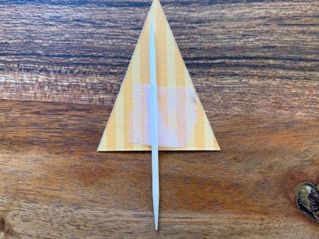 Hershey Kiss-mas Trees - toothpick taped to the back of the triangle