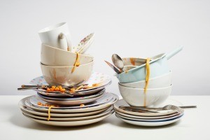 A pile of dirty dishes, waiting to be washed.