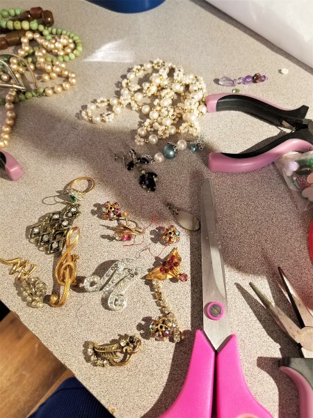 Funnel and Broken Jewelry Christmas Tree - array of broken jewelry, scissors, pliers