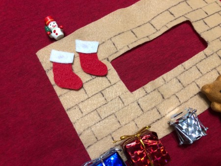 DIY Animated Christmas Hearth Shirt - glue stockings to mantel, small ornaments can also be added
