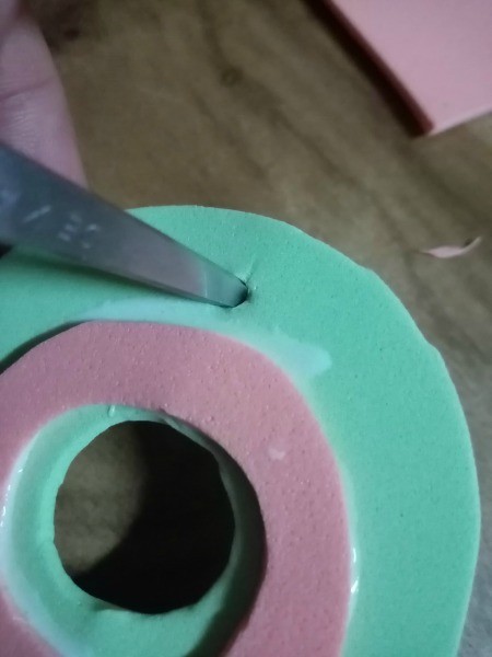 Colorful Retro Inspired Foam Earrings - poking a hole with scissors tip