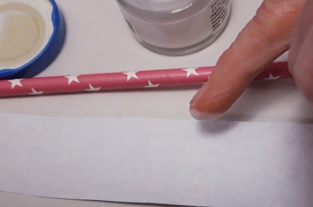 Paper and Drinking Straw Rockets - apply glue to one long edge