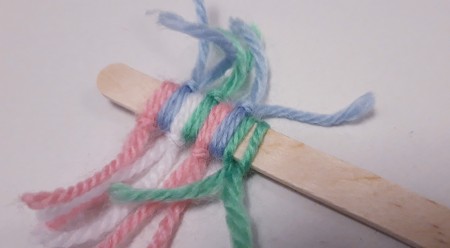 Wood and Yarn Centipede | ThriftyFun