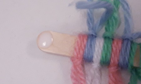 Wood and Yarn Centipede - drop of glue on one end for the eyes