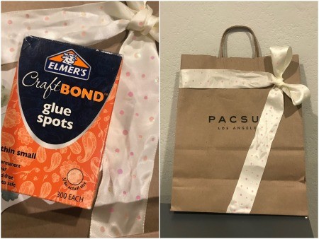 Congratulations Gift Bag - adding a bow to the outside of the Pacsun bag using hot glue and glue spots