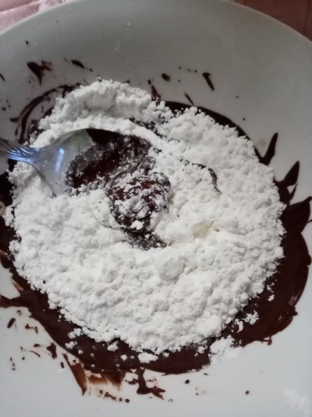 adding flours & corn starch to chocolate